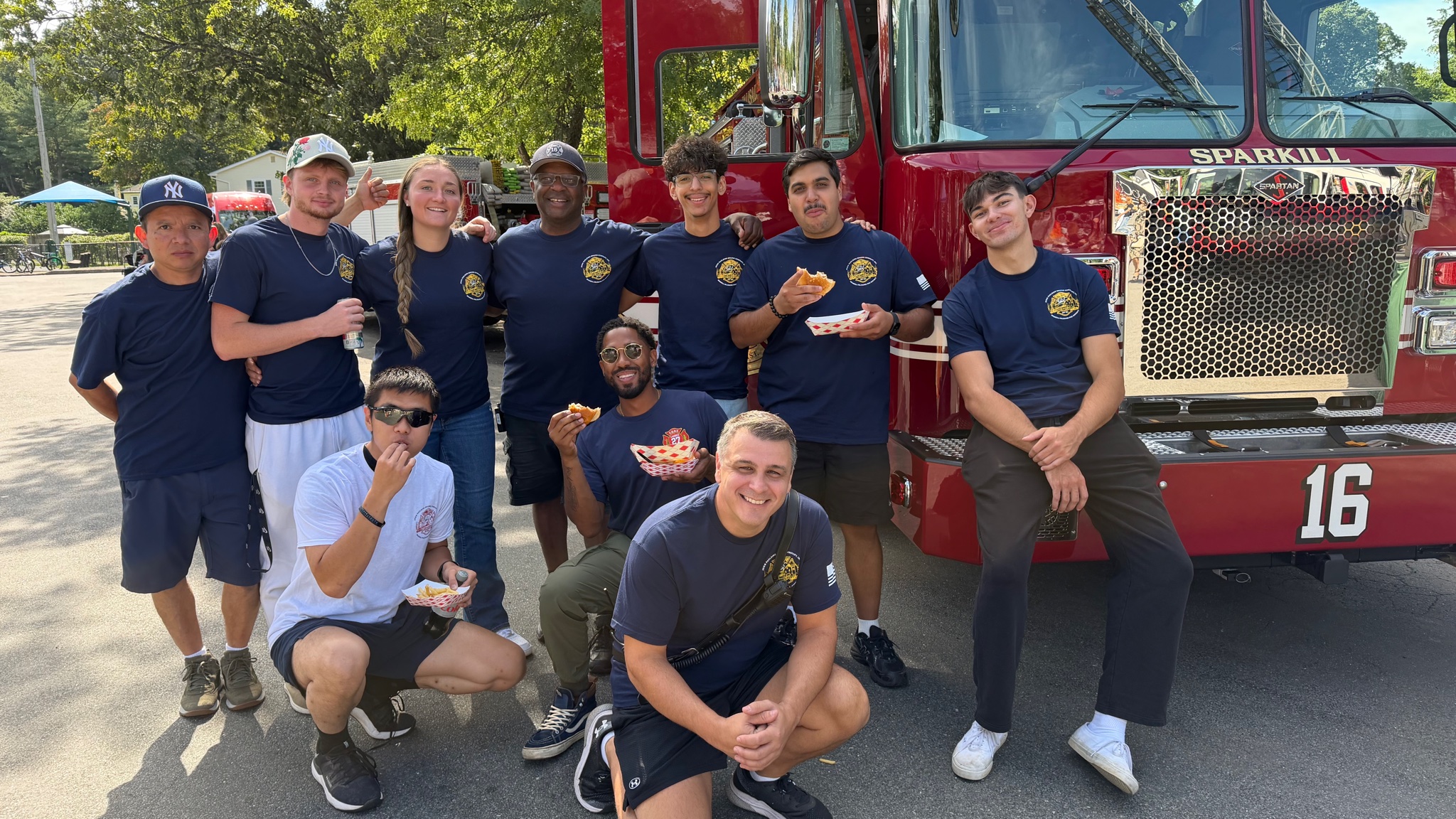 John Paulding Engine Company volunteer firefighters together by Sparkill Unit 16 at Day in the Park